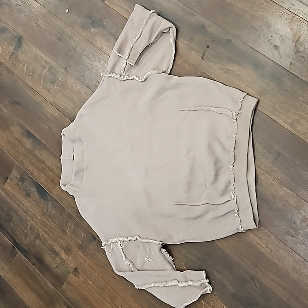 Free People oversized frayed edge mock neck knit in nuetral Size small